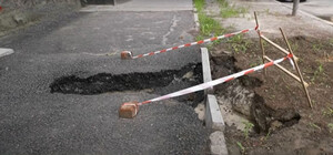 Уходим под землю: в Полтаве после дождей проваливается асфальт