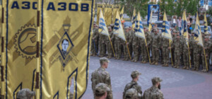 За видеоклип в баре с символикой 