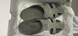 Продавал изношенные тапочки вместо брендовых кроссовок: в Одесской области разоблачили мошенника