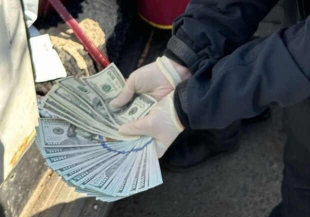 Гроші, які вилучили в затриманих. 
