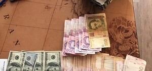 Вымогали по 10 000 с водителя: под Харьковом СБУ разоблачила патрульных-взяточников