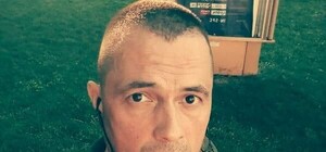 Поджидали возле дома: в столице избили ветерана АТО, совершившего каминг-аут