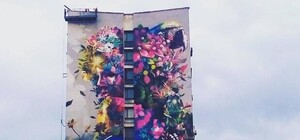 Беспощадно: на Дарницкой площади закрасили яркий мурал на стене высотки