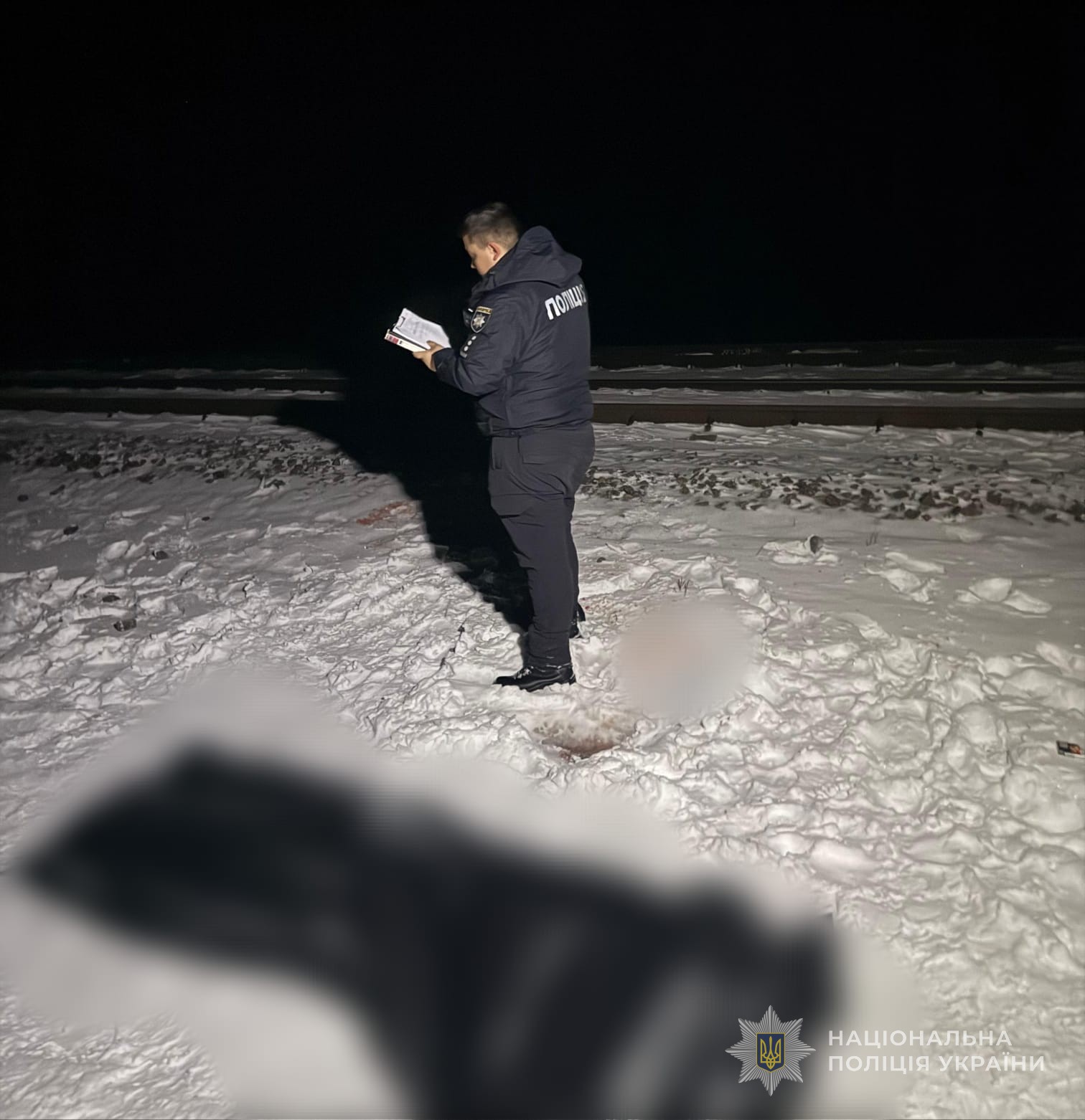 Поліцейський на місці трагедії.