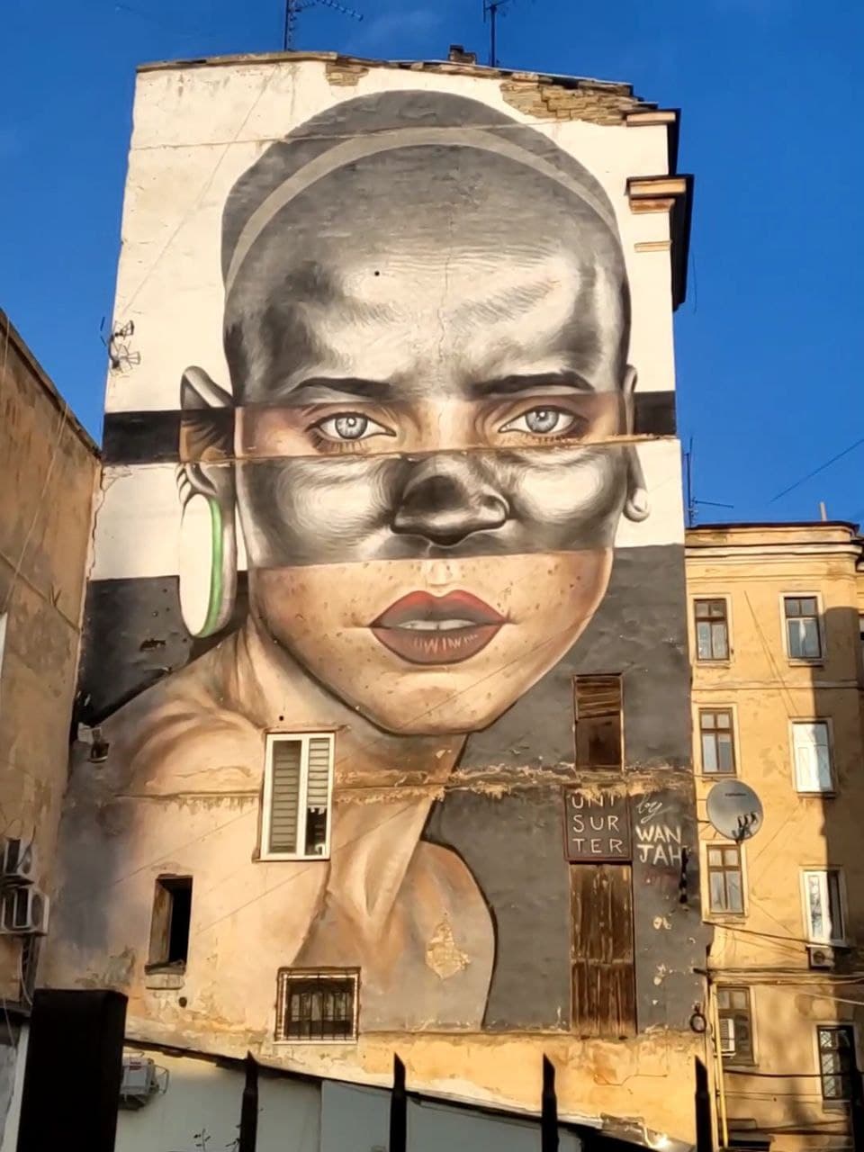 Інтернаціональний мурал на вулиці Князівській.