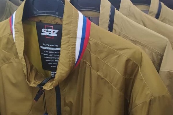 В Одессе продают одежду с триколором: общественники пообещали сжечь товар фото