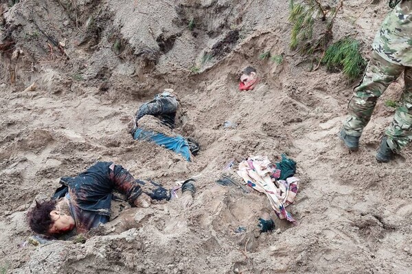 В Сети показали ужасающие фото преступлений оккупантов в Киевской области фото 6